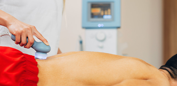Patient receiving Ultrasound Therapy in Cleveland for auto accident injury